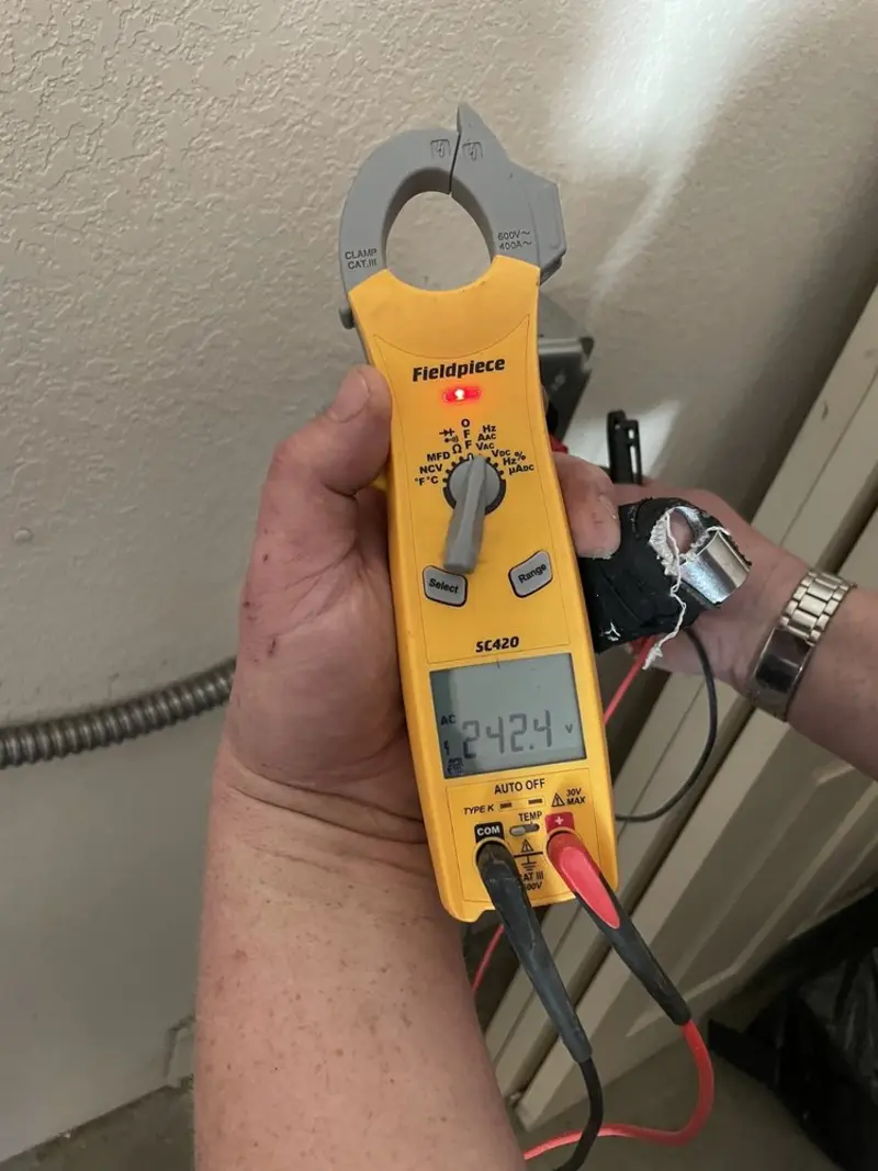 Voltage testing with clamp meter during Generator Installation in Belville